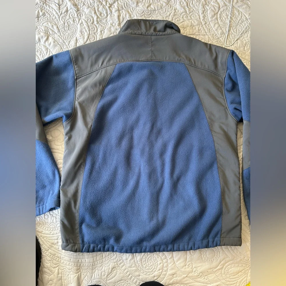 The North Face men’s fleece jacket M. Blue fleece/grey nylon. Decent shape.